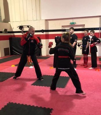 KICK AND PUNCH YOUR WAY TO YOUR BEST SHAPE EVER!